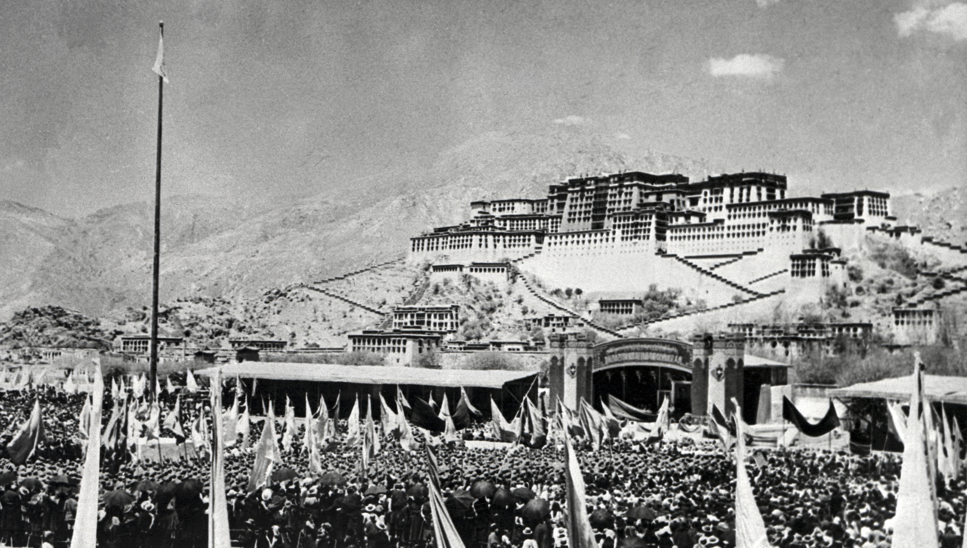 Tibetans gather during the armed uprising against Chinese rule March 10, 1959 in front of the Potala Palace in Lhasa, the capital of Tibet.